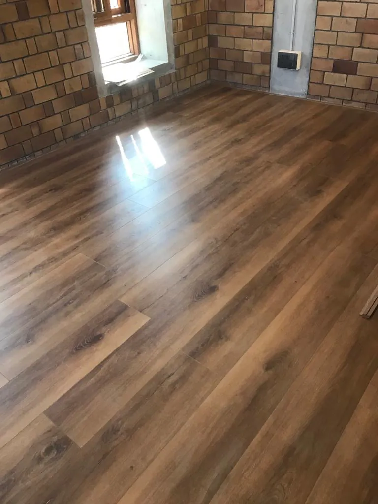 Performance Zone — Laminate AC4, straight-lay, HAL Old Airport Road, 150 sq ft — flooring by Rebel Walls & Floors